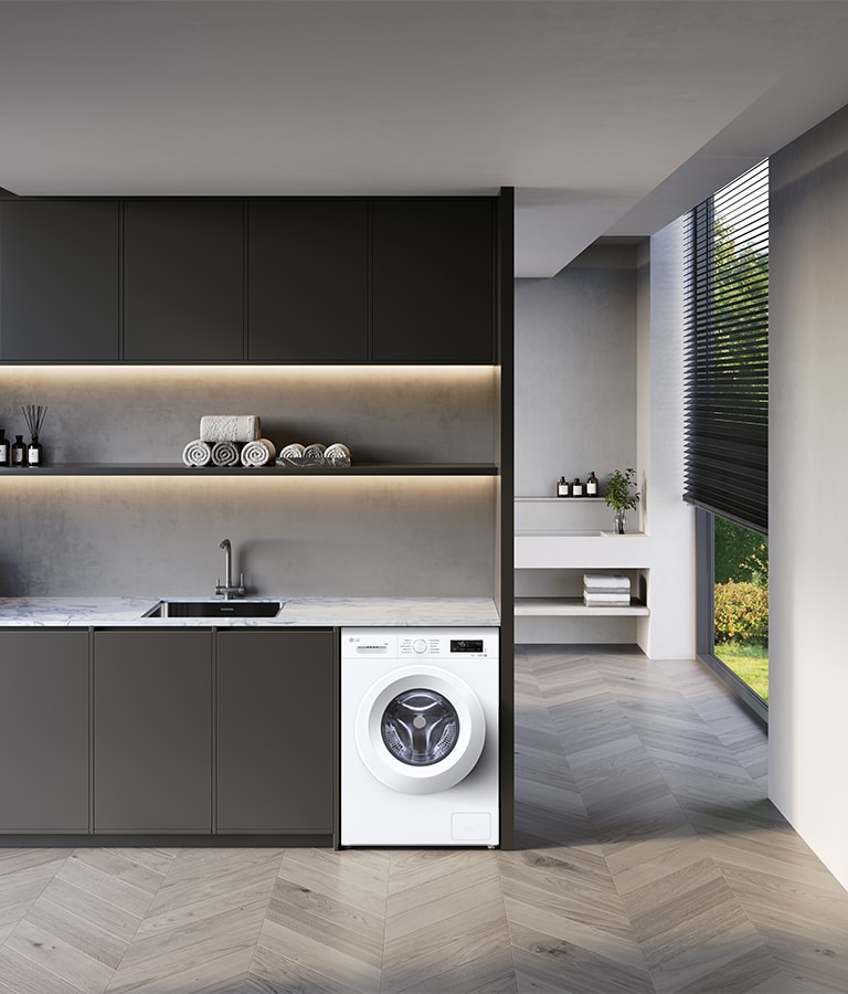 Зображено пральну машину посеред інтер'єру