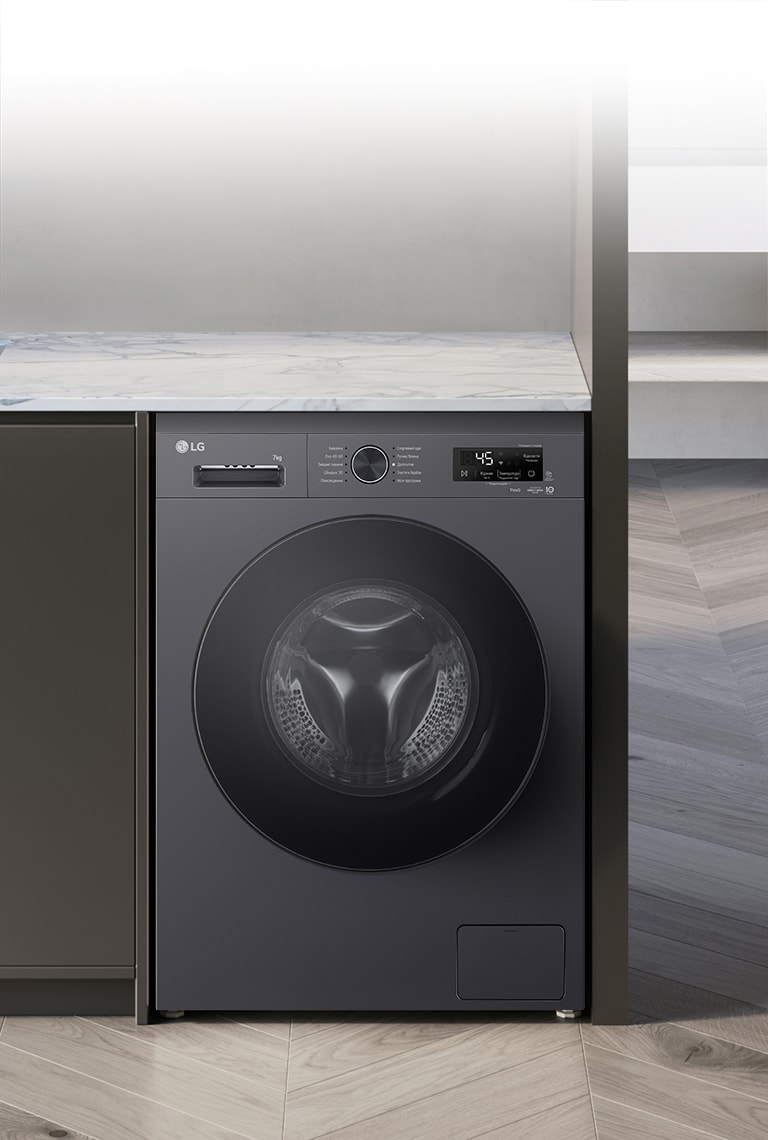Зображено пральну машину посеред інтер'єру