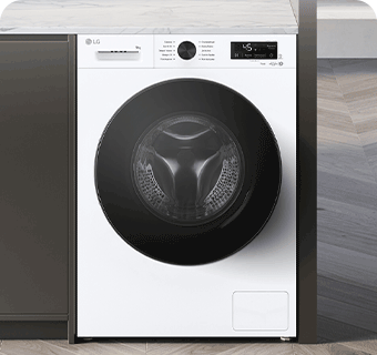 Зображено пральну машину посеред інтер'єру