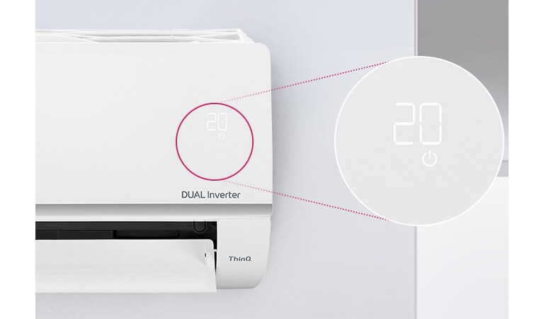 Можна побачити половину кондиціонера LG, встановленого на стіні з відкритими передніми жалюзями, що вказує на те, що він увімкнений. Зображене коло навколо індикаторів якості повітря та збільшене коло праоруч, в якому показані зелені індикатори панелі якості повітря та цифри, які показують точну якість повітря. Логотип DUAL Inverter можна побачити на корпусі кондиціонера.