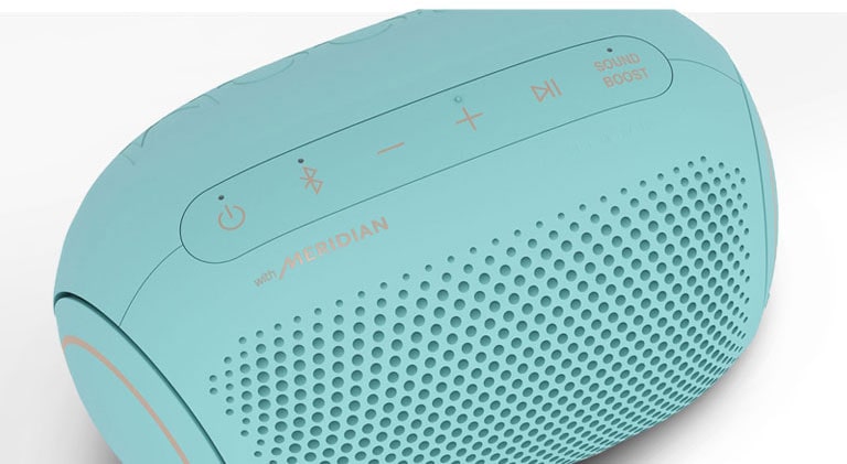 On a white background, There is a close-up of LG XBOOM Go's Meridian logo with magenta lighting. 