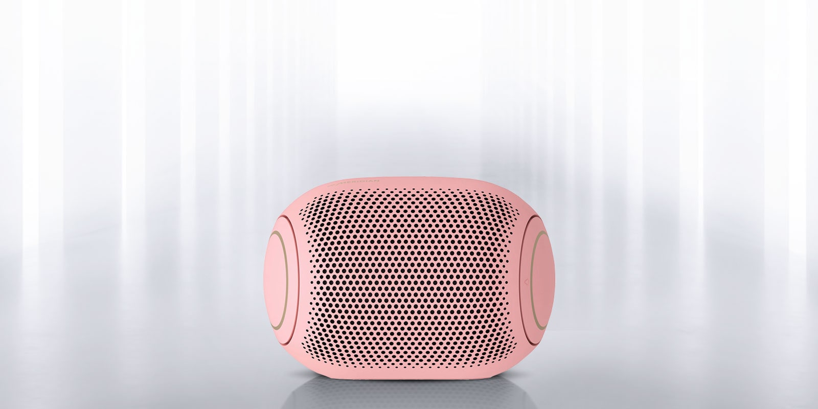 Light shines from the surroundings and the front of the XBOOM Go on either end is visible.