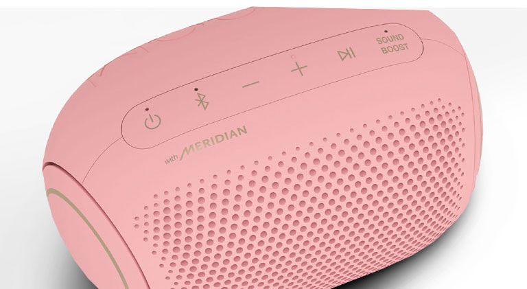 On a white background, There is a close-up of LG XBOOM Go's Meridian logo with magenta lighting. 