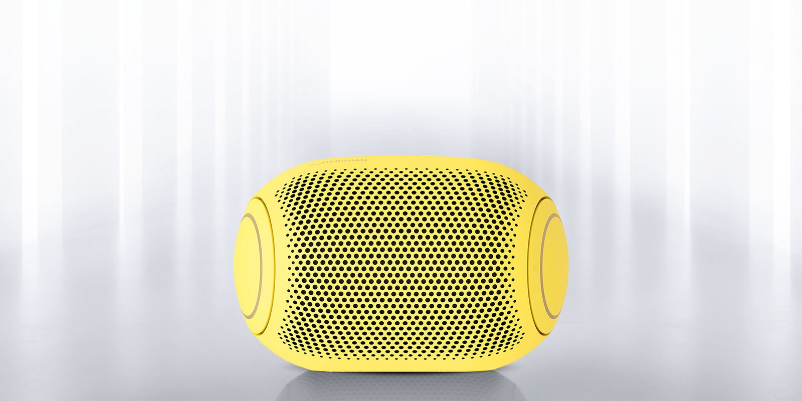 Light shines from the surroundings and the front of the XBOOM Go on either end is visible.