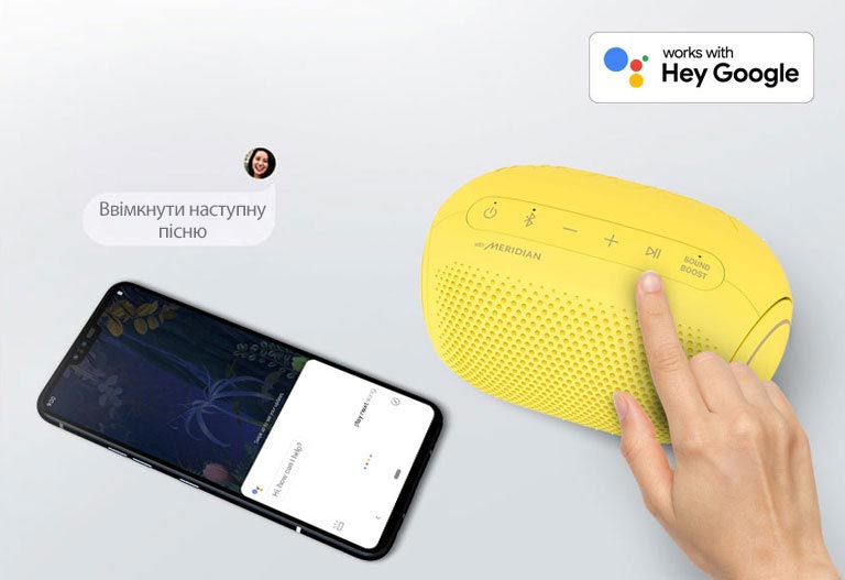 A hand presses a button on LG XBOOM Go. A smartphone is next it. There's a speech bubble. Google's logo is in the top right.