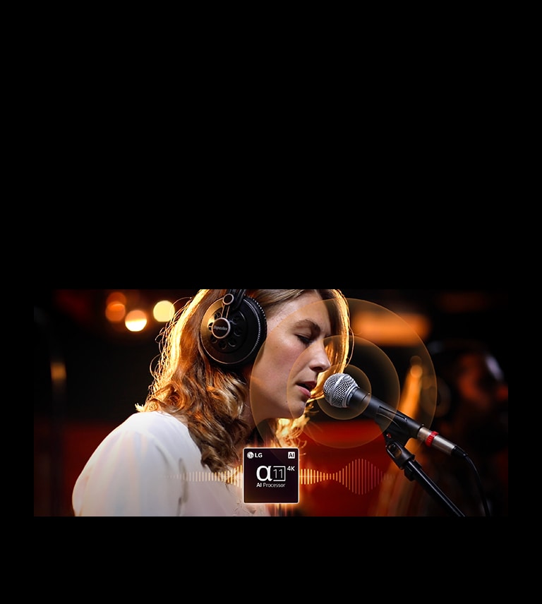 Процесор LG alpha 11 AI Processor 4K розташовано в центрі внизу, а з нього випромінюється звукова хвиля. Позаду жінка співає в мікрофон, а з мікрофона випромінюються кола. Кадр переміщується ліворуч до гітари, а коли грають на струнах, то випромінюються графічні кола.