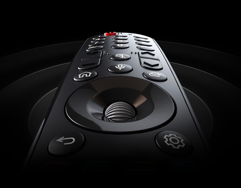 Пульт LG Magic Remote і білі кола, що випромінюються знизу, великий план.