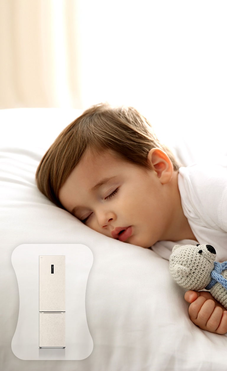 Зображено дитину у ліжку, яка міцно спить.
