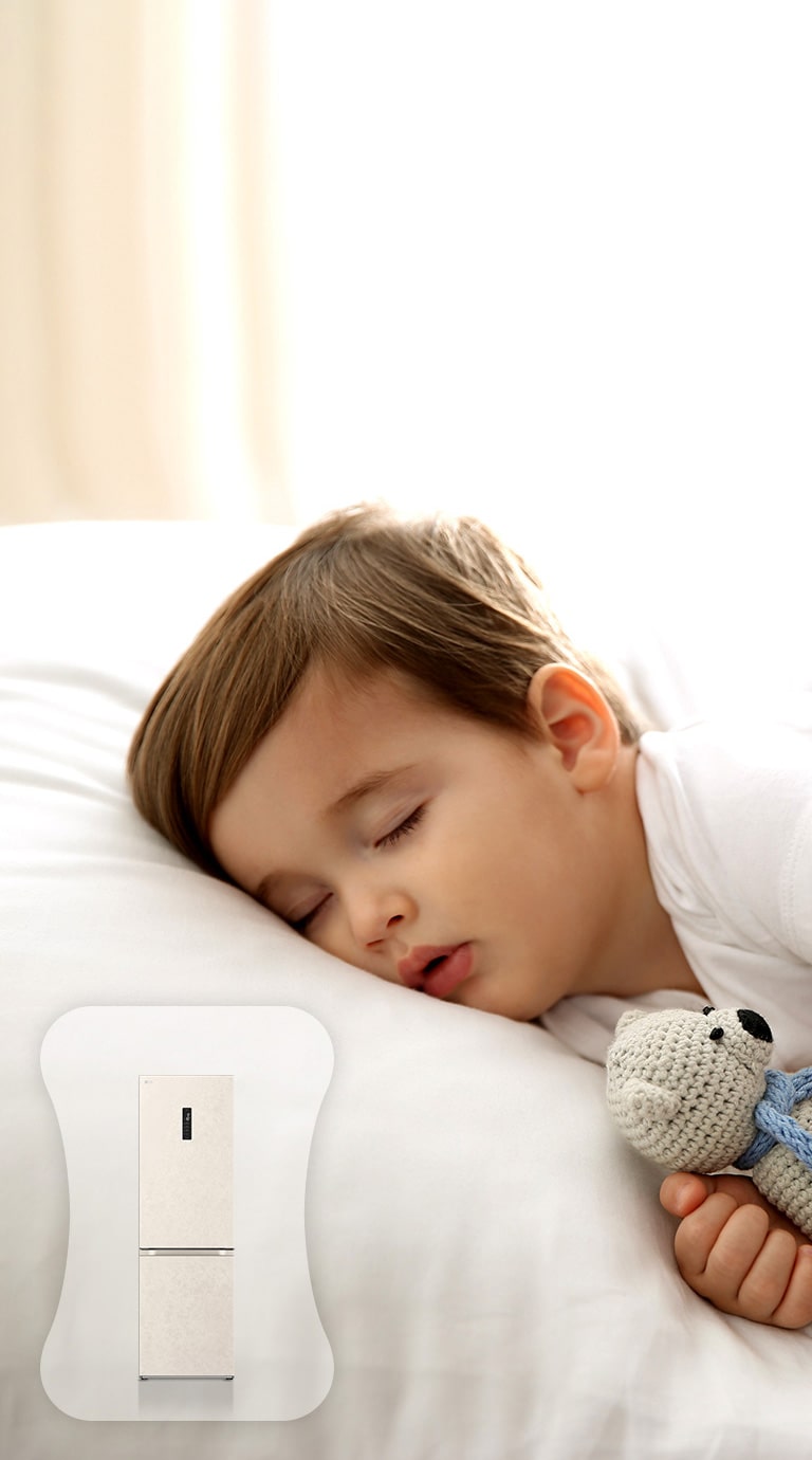 Зображено дитину у ліжку, яка міцно спить.