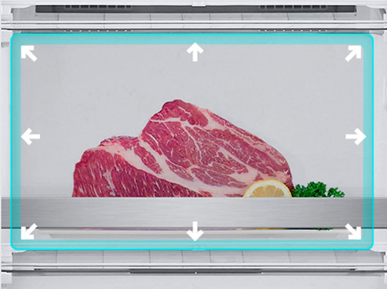 Зображене велике відділення для заморожування з великими шматками м’яса в ньому.