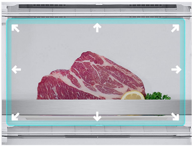 " Зображене велике відділення для заморожування з великими шматками м’яса в ньому."