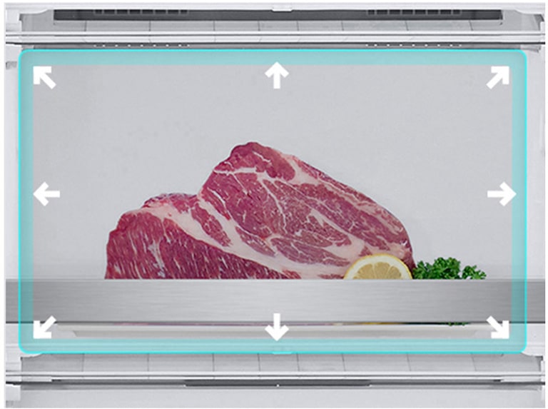 " Зображене велике відділення для заморожування з великими шматками м’яса в ньому."