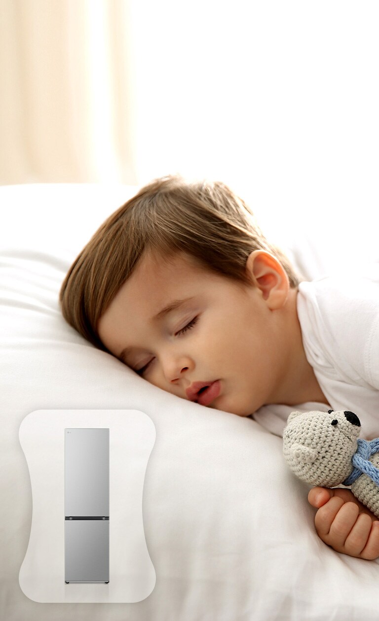 Зображено дитину у ліжку, яка міцно спить.