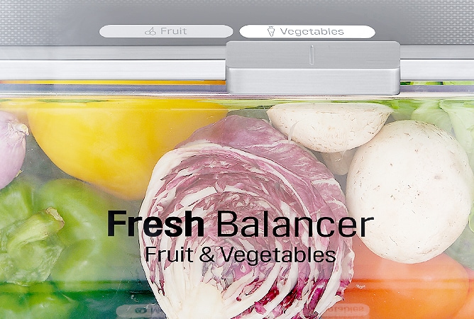  На передньому плані Fresh Balancer, відсік наповнений фруктами, перемикач встановлено на позначку фрукти.