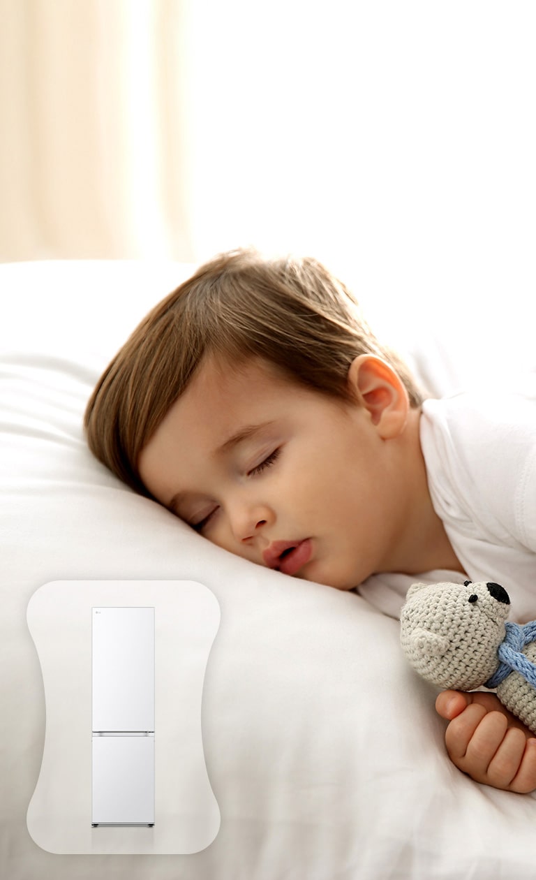 Зображено дитину у ліжку, яка міцно спить.