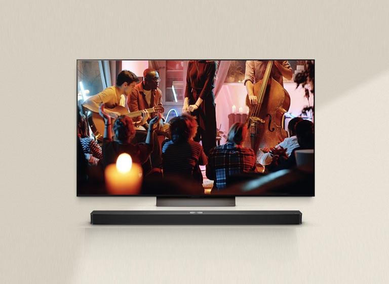 На екрані грає затишний концерт у вітальні. Меню інтерфейсу WOW з’являється як накладання, і користувач переходить до налаштувань звукової панелі.