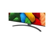 LG Телевізор LG NanoCell AI NANO81 | 86 дюймів | 4K Smart TV | 2025, Порівняння до й після того, як LG 4K Super Upscaling покращує якість зображення. Два панно з однаковим зображенням барвистого птаха, що сидить на гілці в лісі, праве панно вицвіло. Назва говорить про , 86NANO81A6A, thumbnail 8