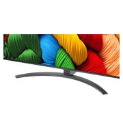 LG Телевізор LG NanoCell AI NANO81 | 65 дюймів | 4K Smart TV | 2025, Порівняння до й після того, як LG 4K Super Upscaling покращує якість зображення. Два панно з однаковим зображенням барвистого птаха, що сидить на гілці в лісі, праве панно вицвіло. Назва говорить про , 65NANO81A6A, thumbnail 8