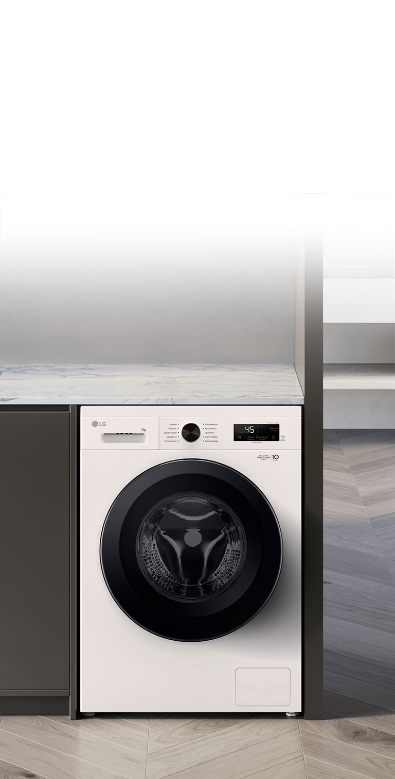 Зображено пральну машину посеред інтер'єру