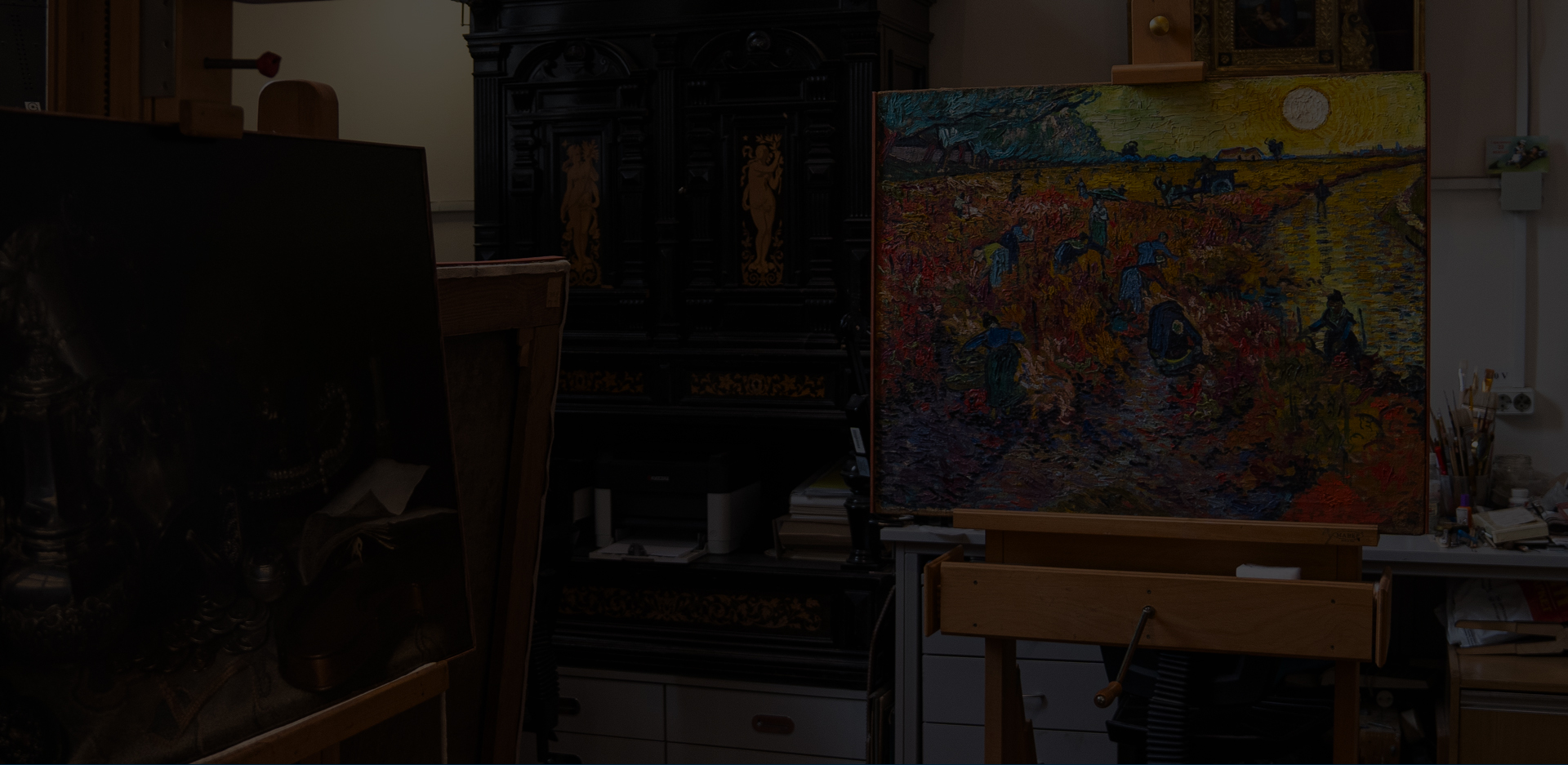 An image of The Red Vineyards at Arles on an easel.