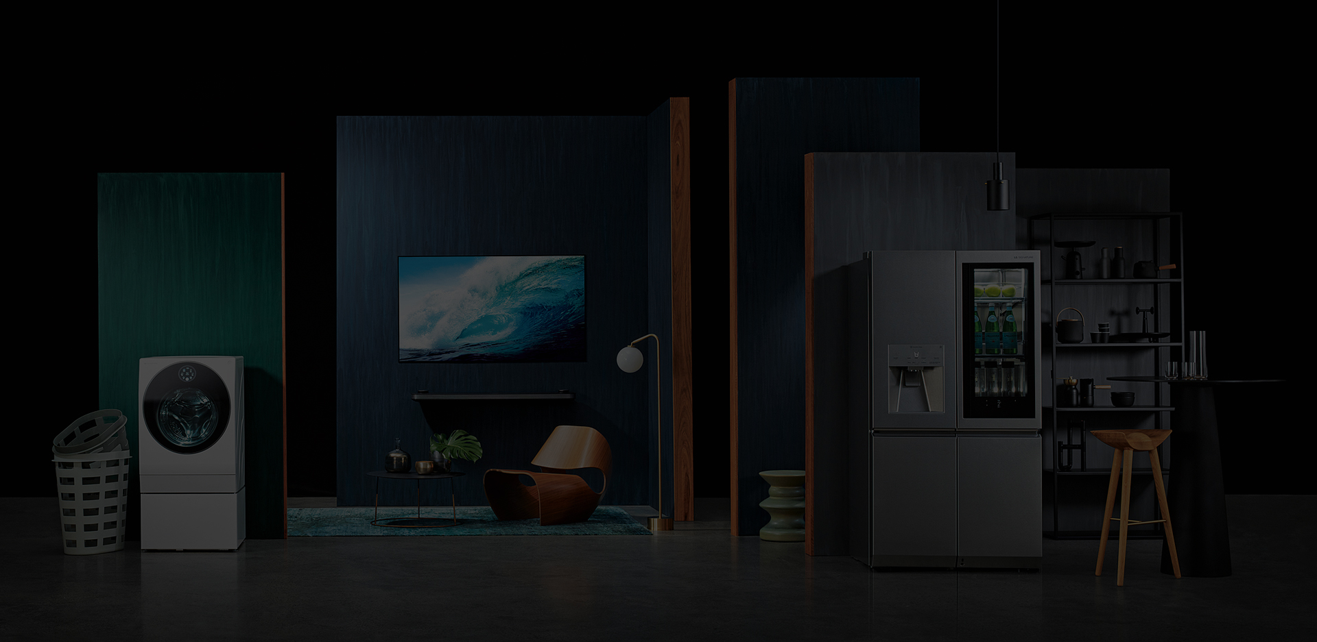 starting from the left, lg signature washing machine, oled tv w, refigerator is displayed with some green and blue wall in some place like a dark studio