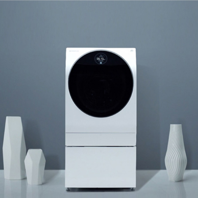 A white LG SIGNATURE Washing Machine in front of a stark grey background with the text 'enamel coating.'