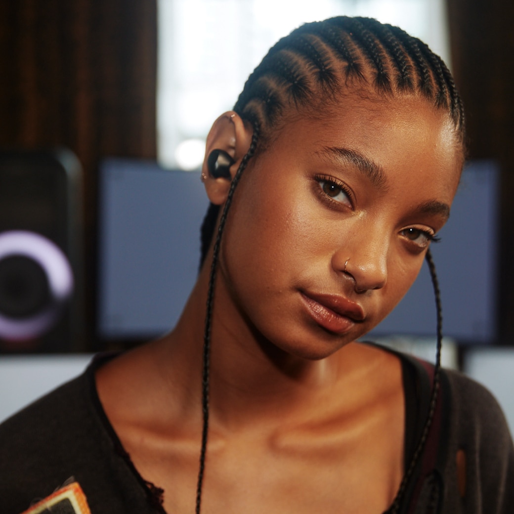 Willow Smith wearing LG Wireless Earbuds