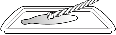 an inlet hose pouring water into shallow pan