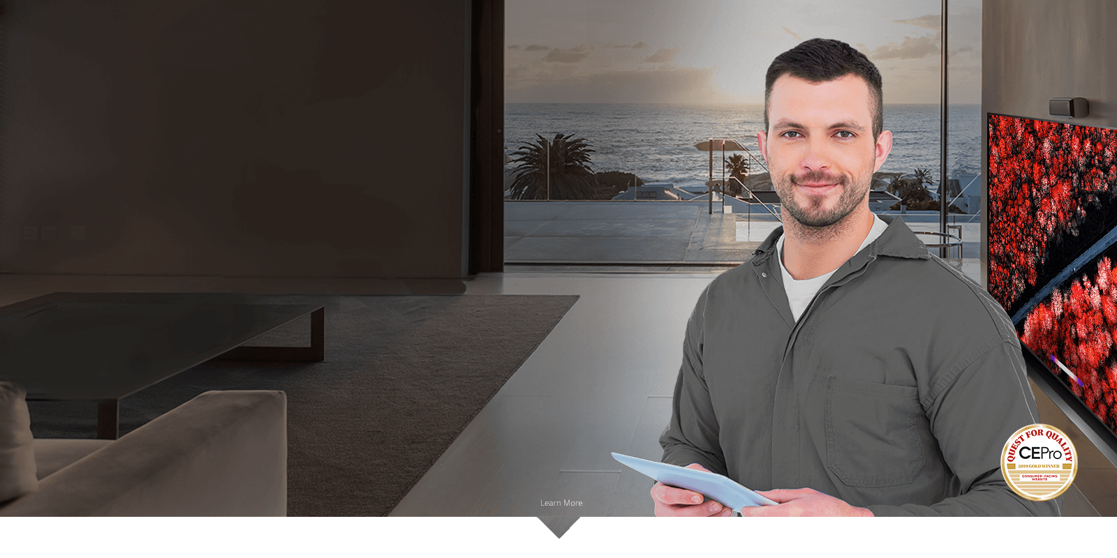 man standing in front of beachfront living roof with lg tv on wall