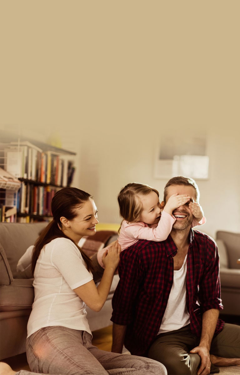 Family relaxing in their living room