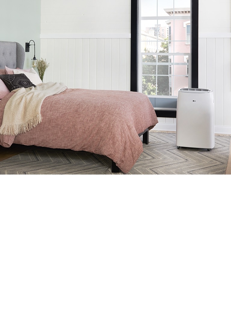 Portable air conditioner in a bedroom
