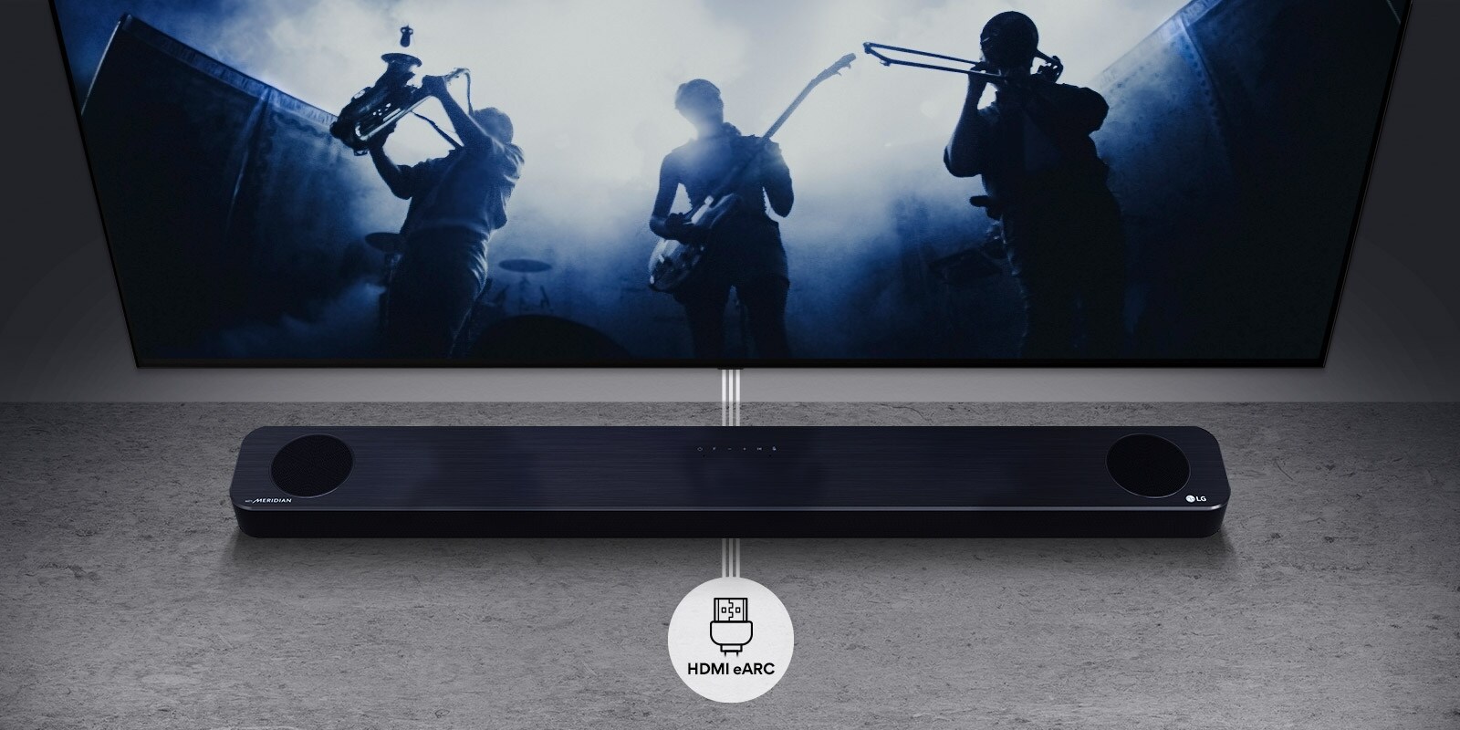 TV is on the wall. TV shows a group of band in black silhouette. LG Soundbar is right below TV on a gray shelf. There is a HDMI eARC icon below the soundbar.