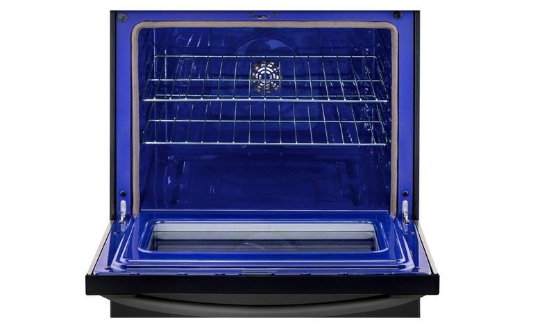 LG oven with open door on white background