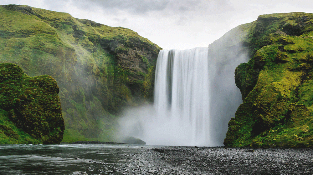 A video showing an image of a grand waterfall that has been enhanced for brighter, more expressive images.