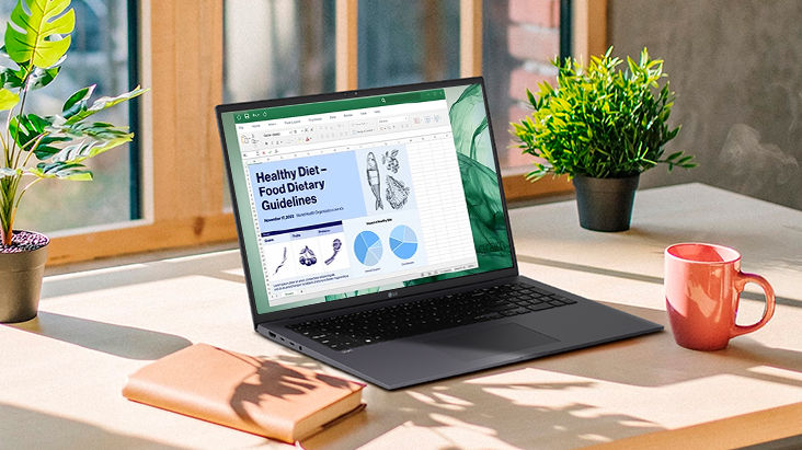 It shows that the LG Gram is placed on a desk surrounded by glass windows, but there is no light reflection on the display.