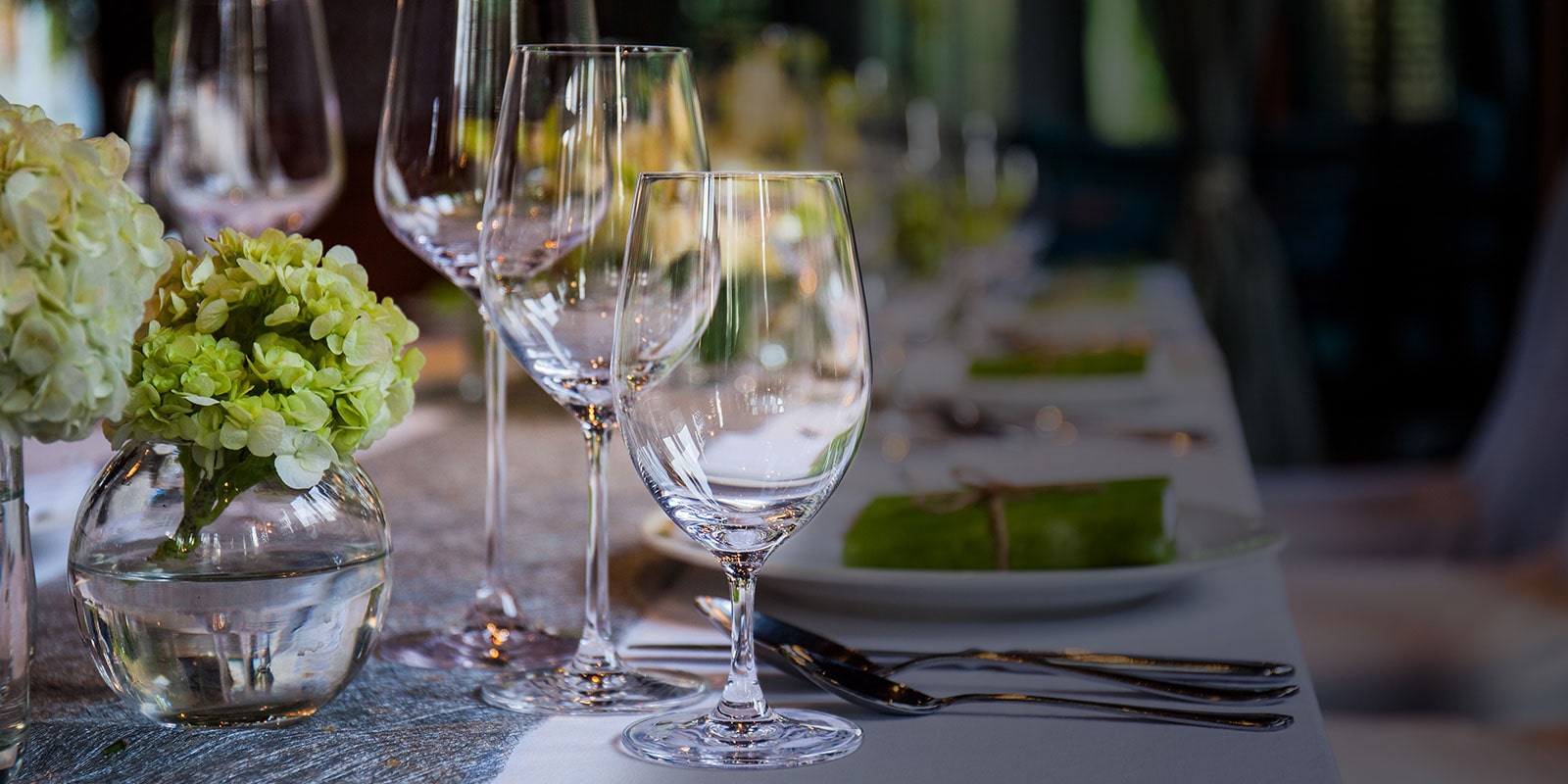 fresh clean glassware on a dinner table 