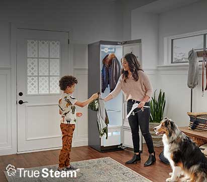 Image of family taking clothes sanitized with TrueSteam® out of LG Styler with TrueSteam® logo