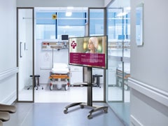 LG TV on the durable Peerless-AV Flat Panel Cart in a hospital