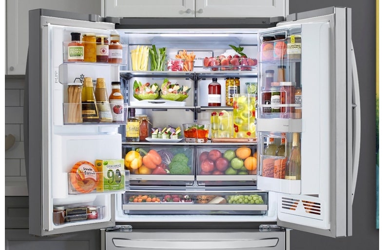 More room to store your food - Opened French Door Refrigerator full of food
