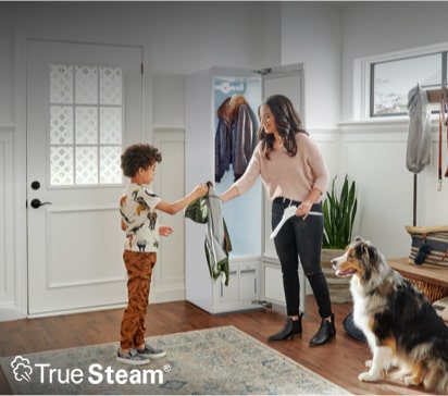 Image of family taking clothes sanitized with TrueSteam® out of LG Styler with TrueSteam® logo