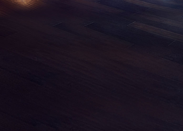 Man in driver's seat changing stations on the car radio