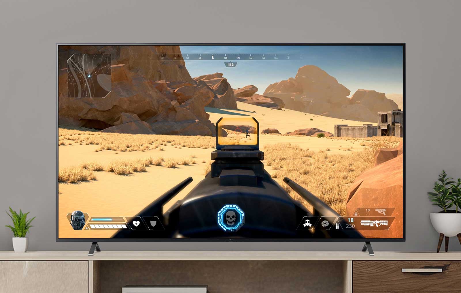 A TV screen playing a video of a FPS game shooting an enemy with a gun. (play the video)