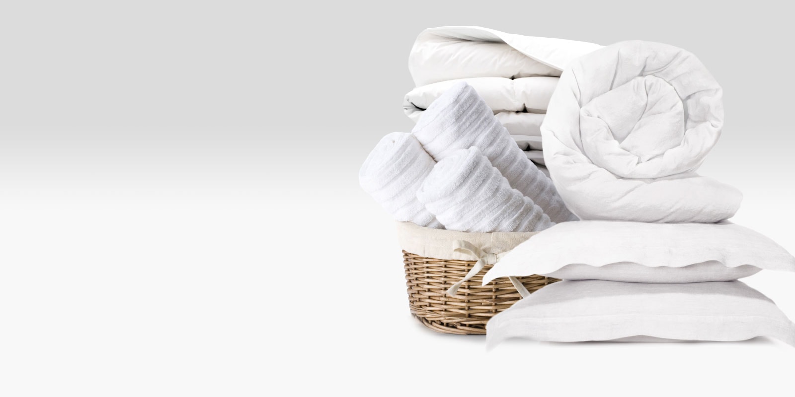 Get It All Done In Less Time - Basket of clean white towels