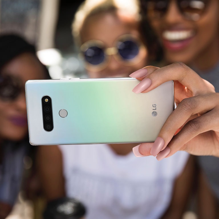 Two women taking a photo with the LG Stylo™ 6 13 MP selfie camera