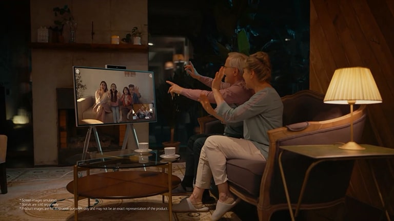 Parents are having a video call with their children and grandchildren.