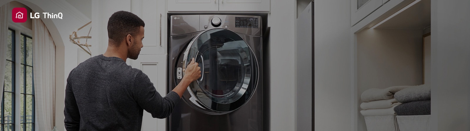 an image of a man opens LG dryer