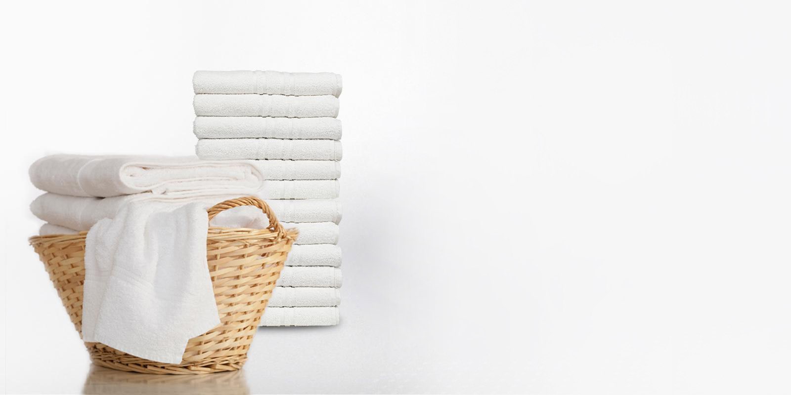 Folded laundered towels showcasing capacity