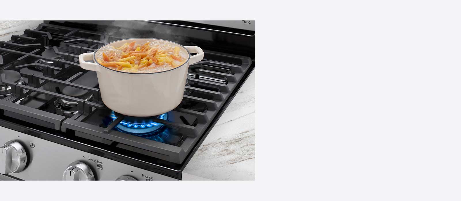 woman putting food in an LG oven