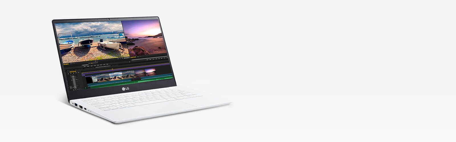 white LG laptop on gray background