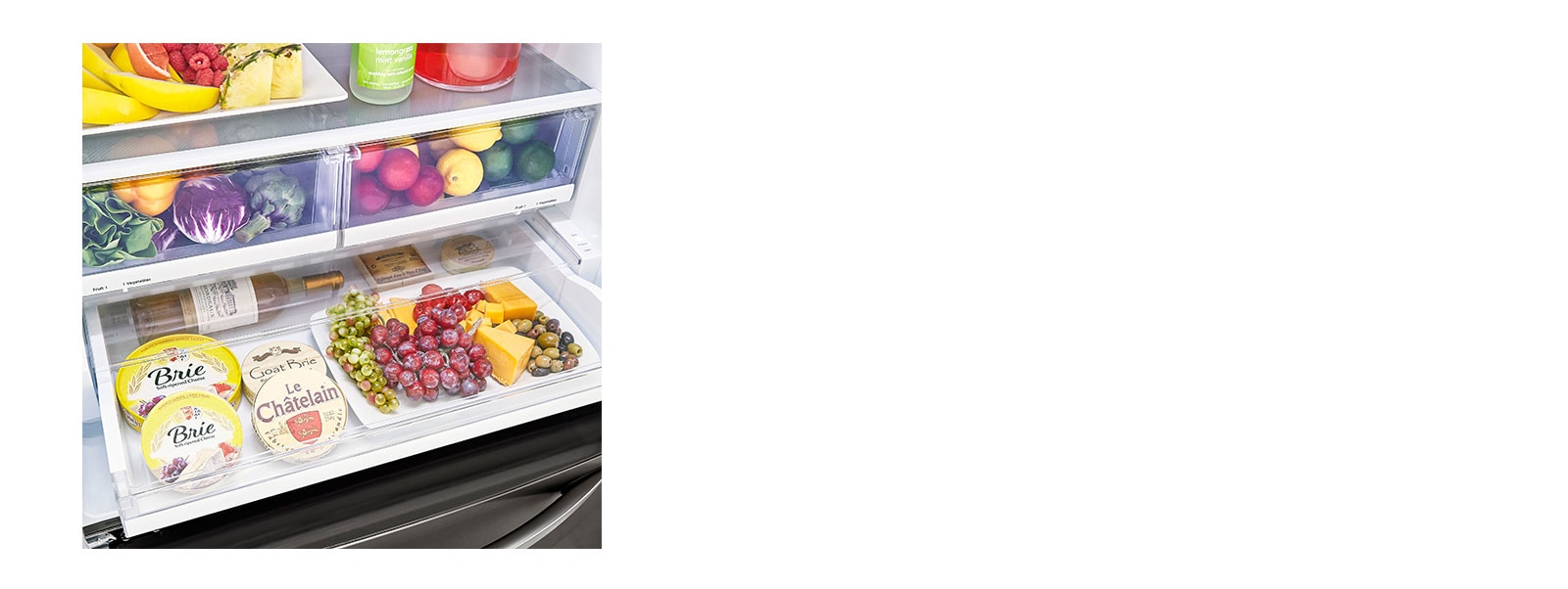 LG LRFXS2503D refrigerator showcasing filled temperature-controlled drawer